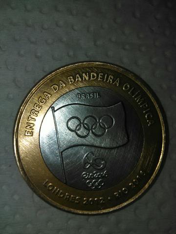 Moeda comemorativa da entrega da Bandeira olimpica