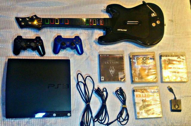 PS3+ 2controles + Guitarra + jogos