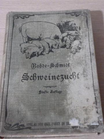 Livro antigo sobre criação de porcos