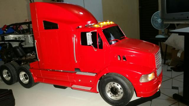 Caminhão tamiya rc 1/14 ford aeromax vermelho com mfc