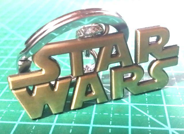 Star Wars - Chaveiro Logotipo Dourado Em Aço