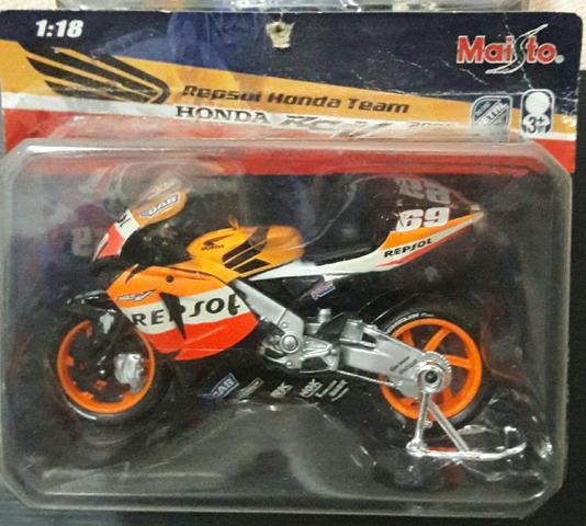 Mini moto de brinquedo novo na caixa