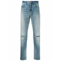 Saint Laurent Calça jeans slim com detalhe destroyed - Azul
