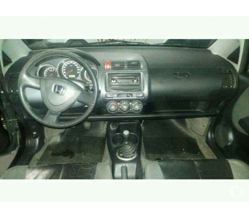 Fit Lx 1.4 gasolina completo, CD e couro