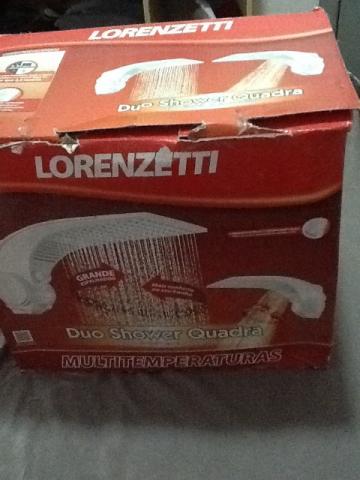 Chuveiro novo na caixa