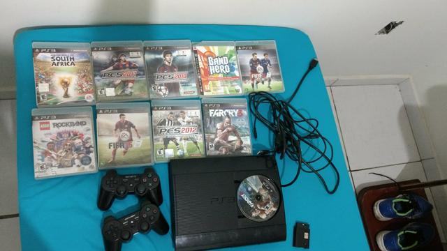 Play 3 com 9 jogos 2 controles 1 original o outro paralelo