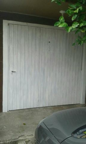 Porta de garagem contrapeso