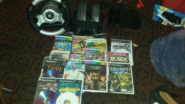 Ps2 com volante e acerelado muito top