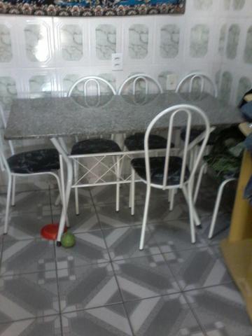 Mesa com 6 cadeiras de granito nova sem uso estou vendendo