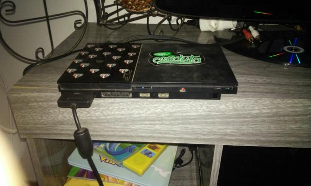 Vendo ps2 semi novo 100%