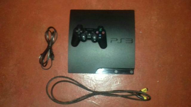 Ps3 travado + jogos + acessórios, tudo bem conservado e