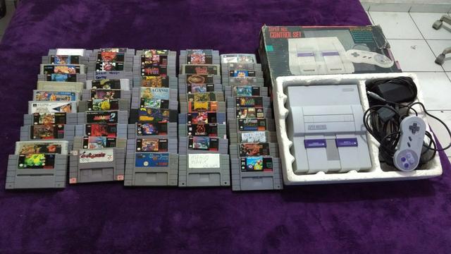 Nintendo c/caixa + 54 Fitas