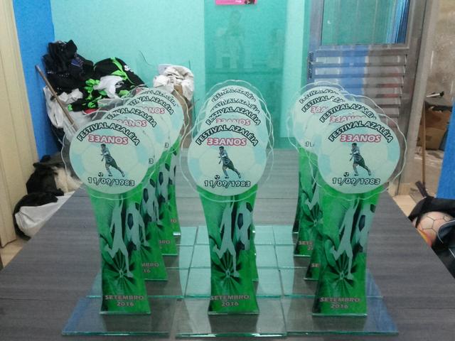 Troféu e medalha de vidro