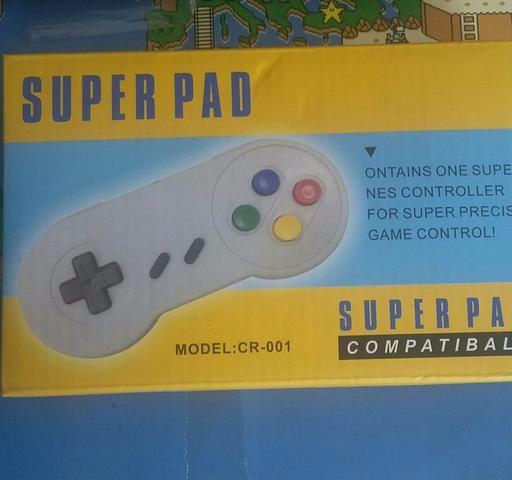 Controle de Super Nintendo na caixa