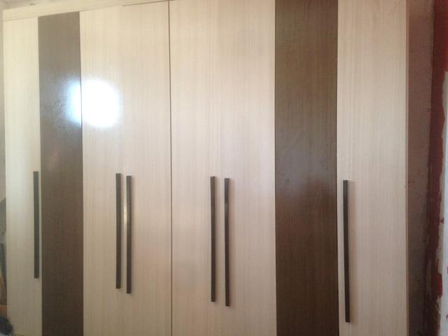 Guarda roupa oito portas