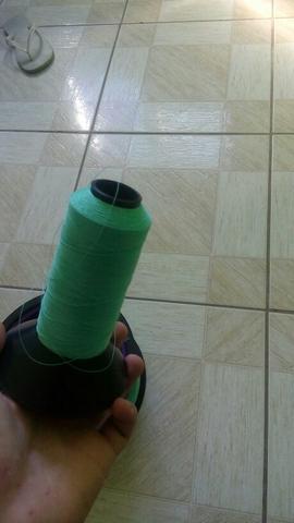 Carretilha e linha vera cruz