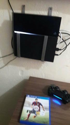 Vendo ps4 com jogo