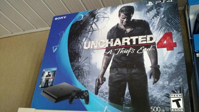 PlayStation 4 ps4 slim, com jogo uncharted 4 lacrado na