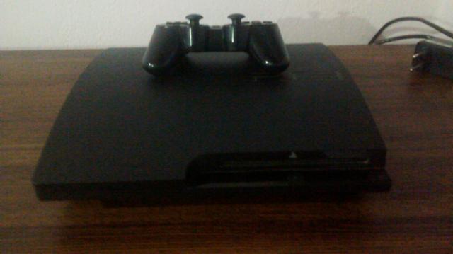 Vendo PlayStation  com 5 jogos