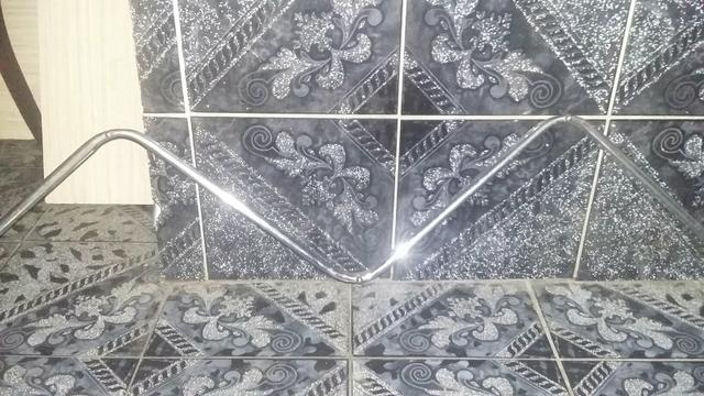 Arara de parede inox