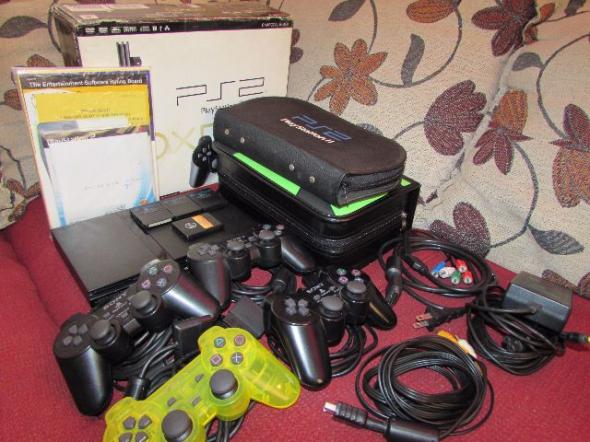 Playstation 2 Slim, 4 controles, 4 Memory Card e 128 Jogos