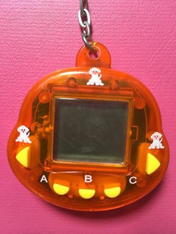 Tamagotchi cor laranja