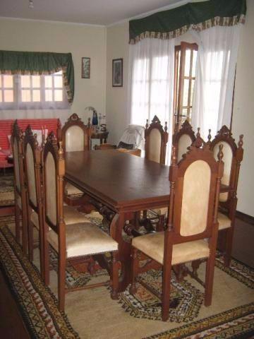 Mesa com 6 cadeiras em couro