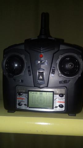 1radio controle fq777 x5c, não tem drone,1cabo carregador