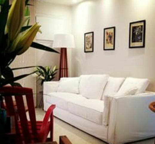 Sofá de plumas capa de sarja