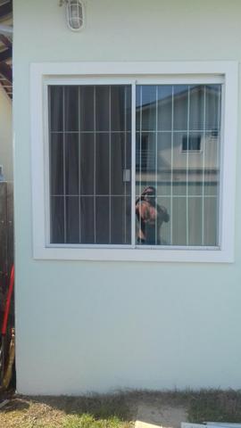 Vendo Janela Blindex e grade de ferro