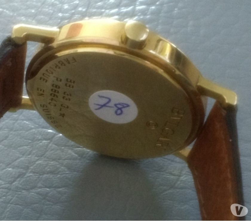 Relógio marca byugari modelo social ouro couro