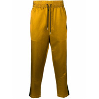 AMI Calça esportiva com contrastes - Dourado