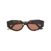 Bottega Veneta Eyewear Óculos de sol oval com efeito tartaruga - Marrom