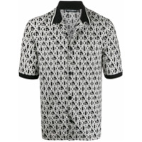 Dolce & Gabbana Camisa polo com estampa de logos DG - Preto