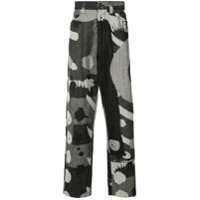 Homme Plissé Issey Miyake Calça jeans ampla com estampa abstrata - Preto