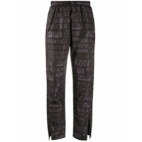 Kirin Calça com fenda e estampa de logo - Preto