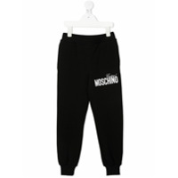 Moschino Kids Calça esportiva com estampa de logo - Preto