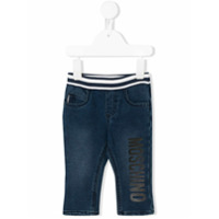 Moschino Kids Calça jeans com estampa de logo - Azul