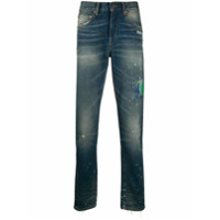 Off-White Calça jeans com efeito de respingos de tinta - Azul