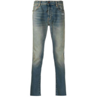 Off-White Calça jeans skinny com listras diagonais e efeito destroyed - Azul