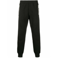 Alexander McQueen Calça esportiva cenoura com patch de logo - Preto