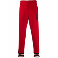 Alexander McQueen Calça esportiva com estampa de caveira - Vermelho