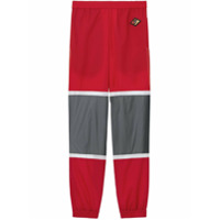 Burberry Calça esportiva de nylon com listras e logo gráfico - Vermelho