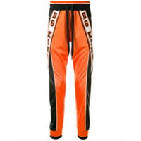 Dolce & Gabbana Calça esportiva com listras Royals - Laranja