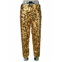 Dolce & Gabbana Calça esportiva com logo e paetês - Dourado