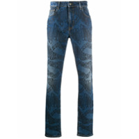 Moschino Calça jeans slim com estampa de logo - Azul