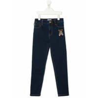 Moschino Kids Calça jeans skinny com aplicação de patch - Azul