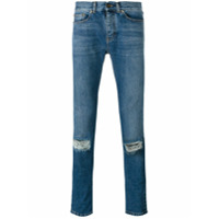 Saint Laurent Calça jeans com detalhes desfiados - Azul