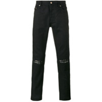 Saint Laurent Calça jeans slim fit com detalhe rasgado - Preto