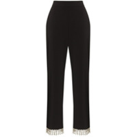 Shrimps Calça Hank cropped com franjas - Preto